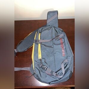 Patagonia Sling Bag in Dark Gray and Mustard